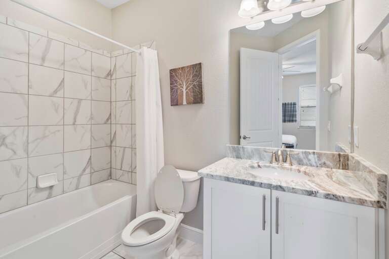 Bathroom with shower and tub combo Bathroom with shower and tub combo