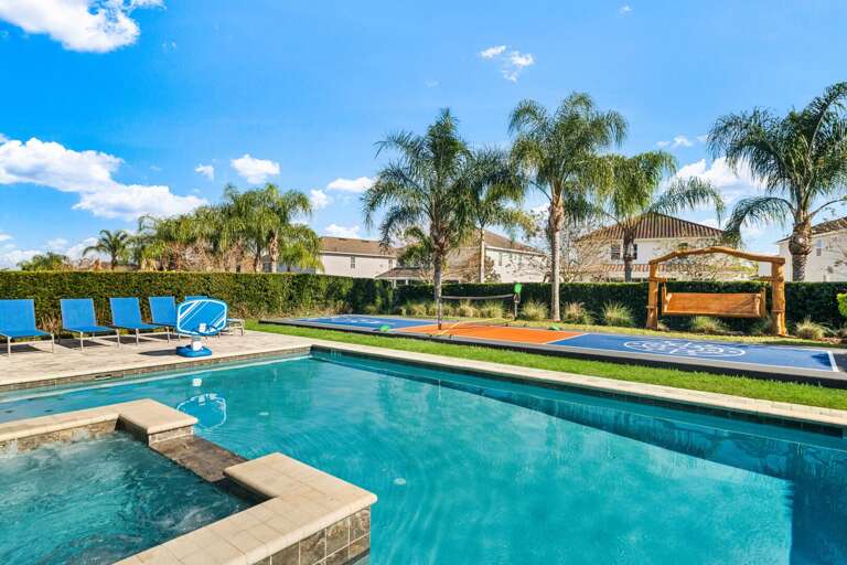 - Private pool with crystal clear water and relaxing spa hot tub  
- Outdoor lounge chairs for