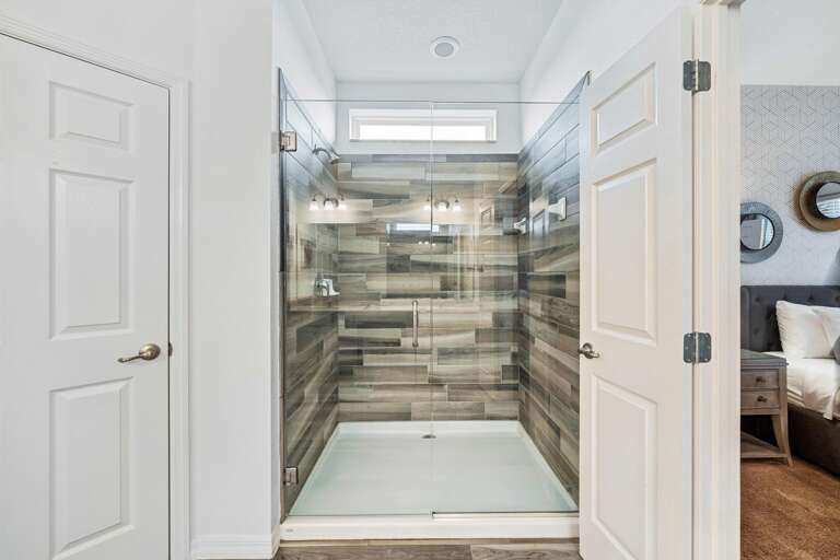 Bathroom with glass enclosed shower