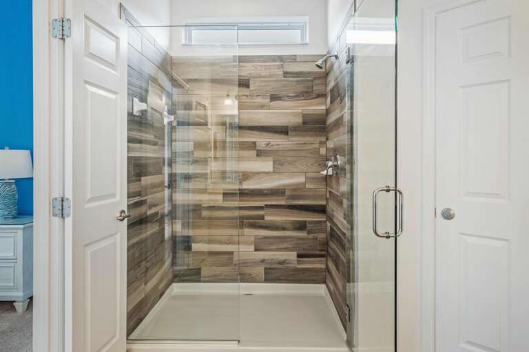 Bathroom with glass enclosed shower