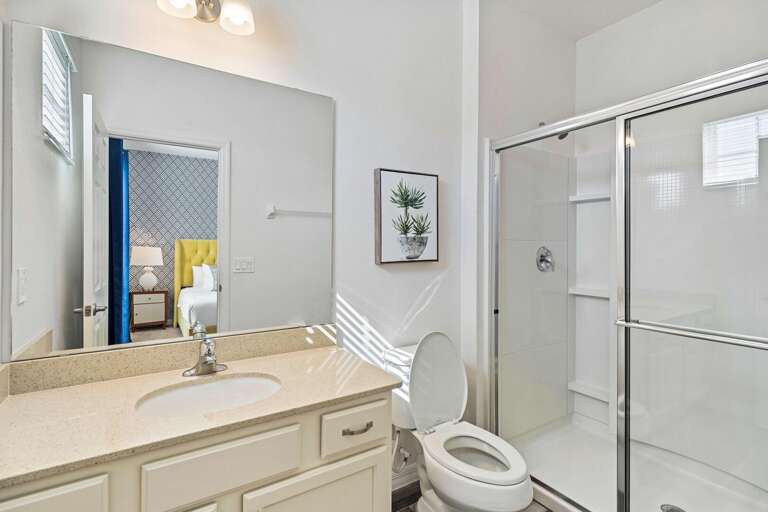 Bathroom with glass enclosed shower