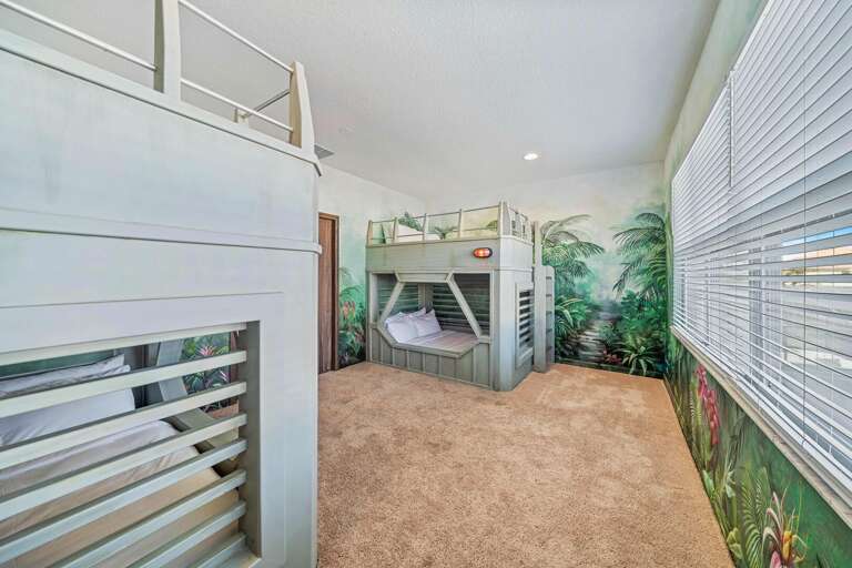 Sleep in raptor cages! Jurassic bedroom with FullXL beds