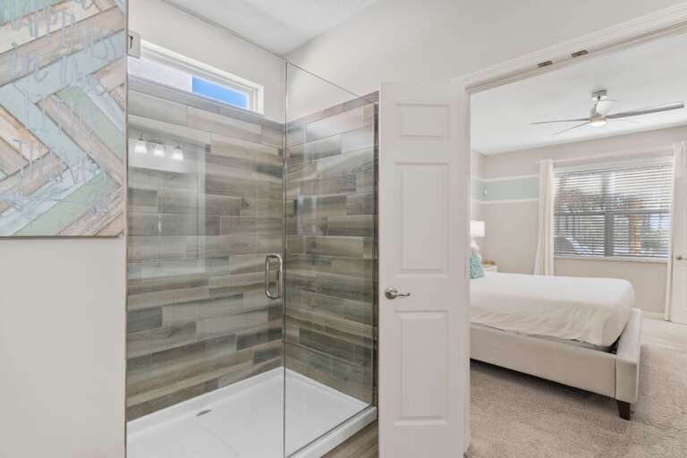 Bathroom with glass enclosed shower