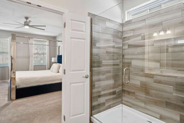 Bathroom with glass enclosed shower