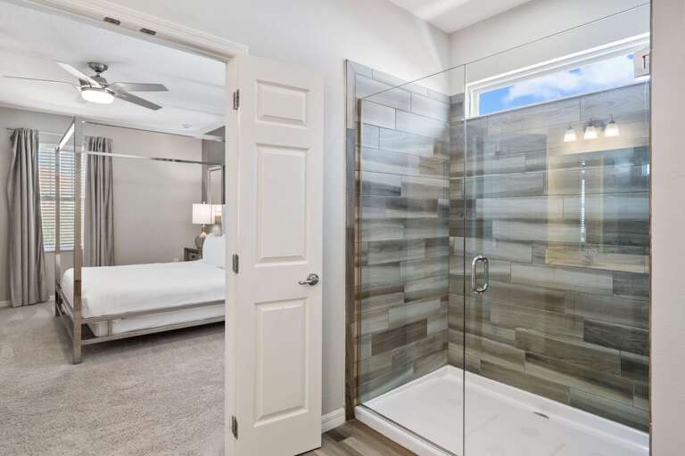 Bathroom with glass enclosed shower