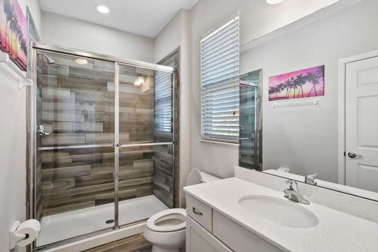 Bathroom with glass enclosed shower
