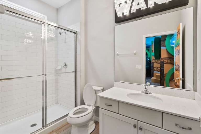 Bathroom with glass enclosed shower
