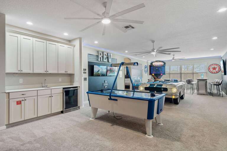 Game room with Air hockey and Mustang pool table