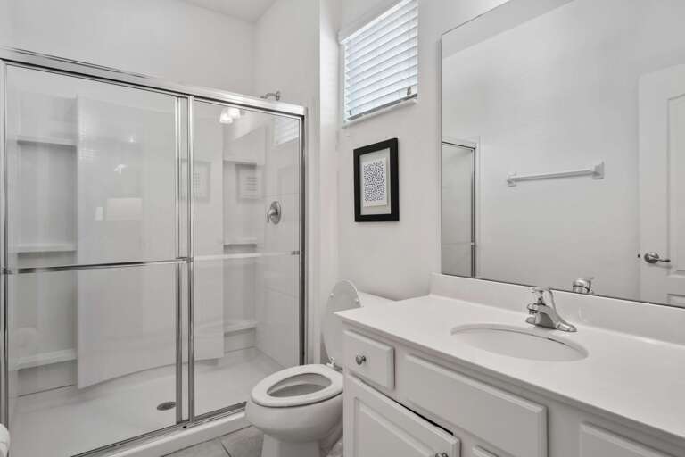 Bathroom with glass enclosed shower