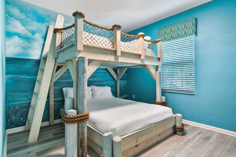 Bedroom with Queen over Queen bunk beds