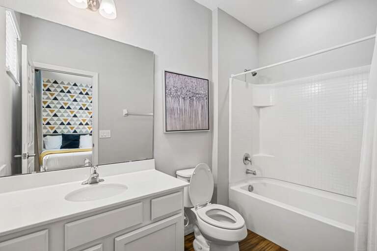 Bathroom with bath and shower combo