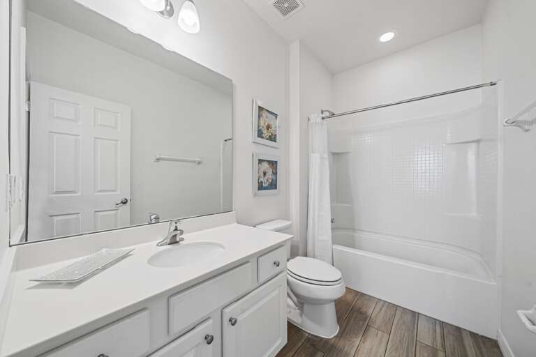 Bathroom w/ bath and shower combo Bathroom w/ bath and shower combo