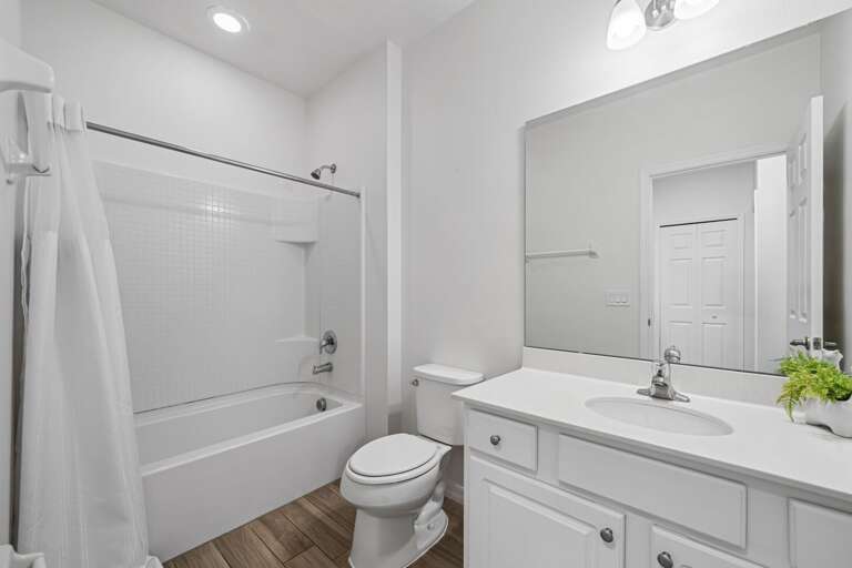 Bathroom w/ bath and shower combo Bathroom w/ bath and shower combo