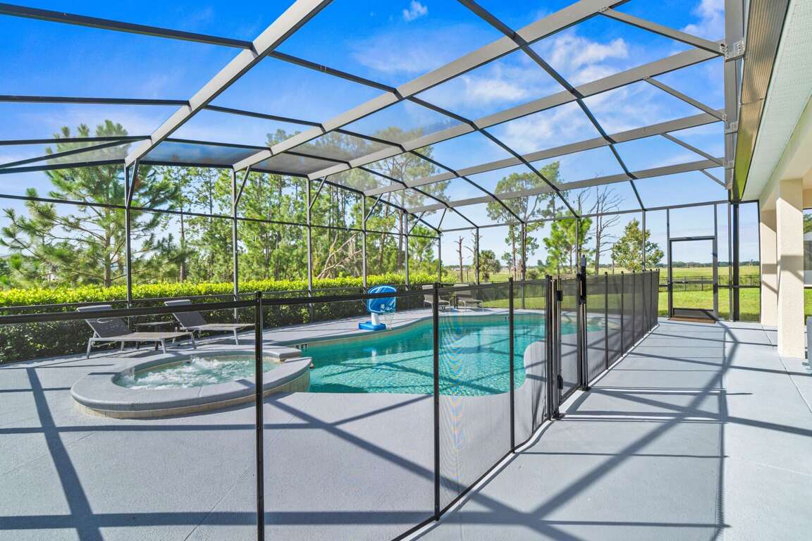 - Covered patio with outdoor dining by the pool  
- Orlando family vacation villa with modern seating  
- Lakeside villa rental near Disney with screened lanai - Covered patio with outdoor dining by the pool  
- Orlando family vacation villa with modern seating  
- Lakeside villa rental near Disney with screened lanai
