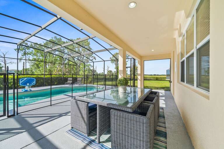 - Covered patio with outdoor dining by the pool  
- Orlando family vacation villa with modern seating  
- Lakeside villa rental near Disney with screened lanai - Covered patio with outdoor dining by the pool  
- Orlando family vacation villa with modern seating  
- Lakeside villa rental near Disney with screened lanai