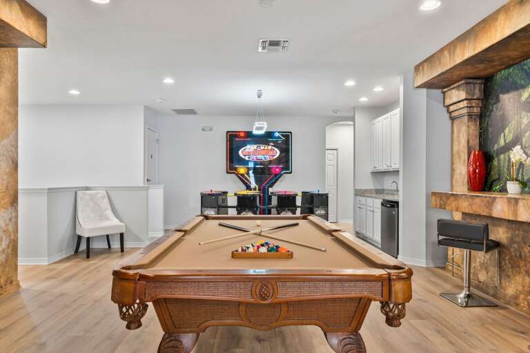 - Game room with billiards and bar seating  
- Orlando villa rental with entertainment lounge  
- Family-friendly vacation home near Disney resorts - Game room with billiards and bar seating  
- Orlando villa rental with entertainment lounge  
- Family-friendly vacation home near Disney resorts