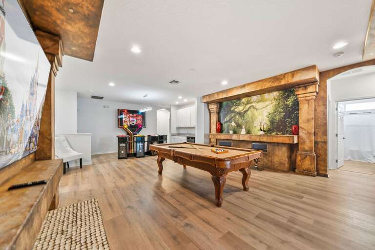 - Spacious game and lounge area with pool table  
- Orlando vacation villa with bar and seating space  
- Family rental near Disney with fun entertainment - Spacious game and lounge area with pool table  
- Orlando vacation villa with bar and seating space  
- Family rental near Disney with fun entertainment