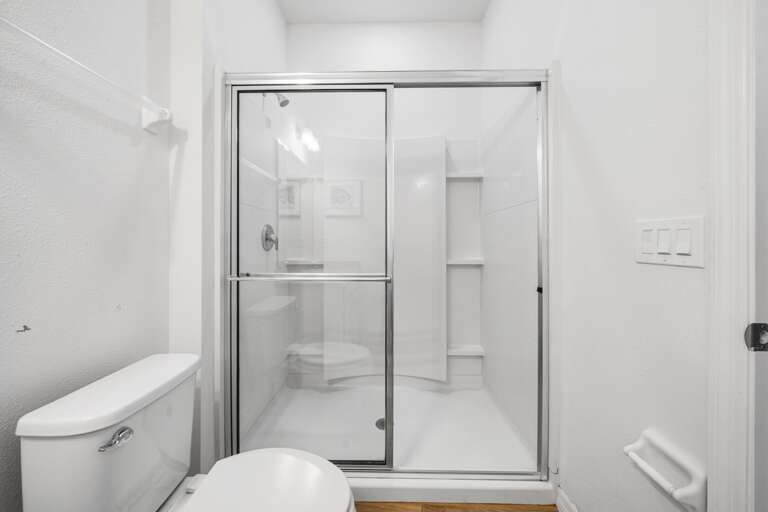 Bathroom w/ glass enclosed shower Bathroom w/ glass enclosed shower