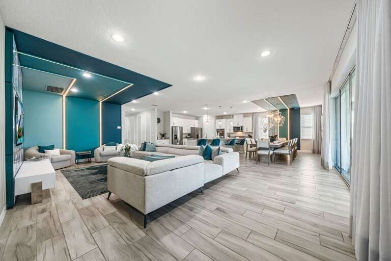 Well lit open living, kitchen and dining space Well lit open living, kitchen and dining space