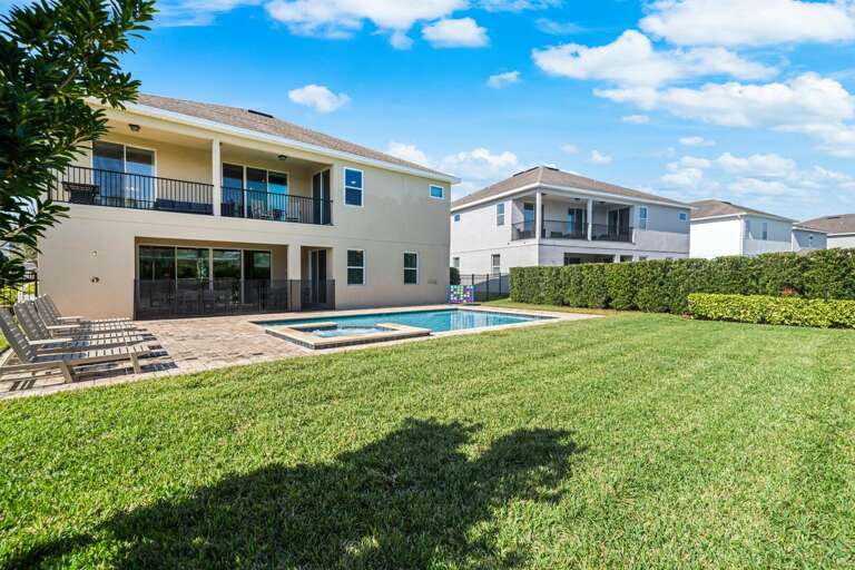 - Your backyard paradise: pool, hot tub, and endless sunshine.
- Sun, fun, and relaxation. Pool, hot tub, and loungers await!