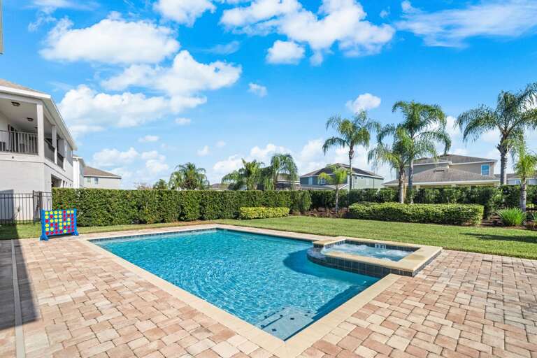 - Your backyard paradise: pool, hot tub, and endless sunshine.
- Sun, fun, and relaxation. Pool, hot tub, and loungers await!