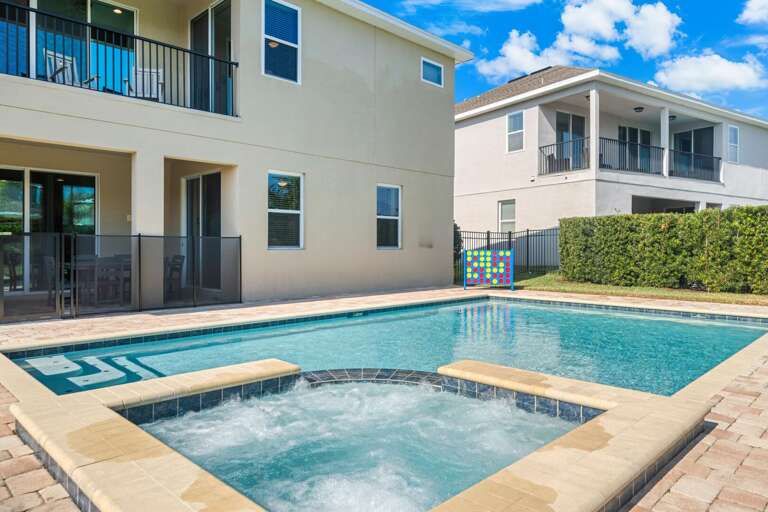 - Your backyard paradise: pool, hot tub, and endless sunshine.
- Sun, fun, and relaxation. Pool, hot tub, and loungers await!