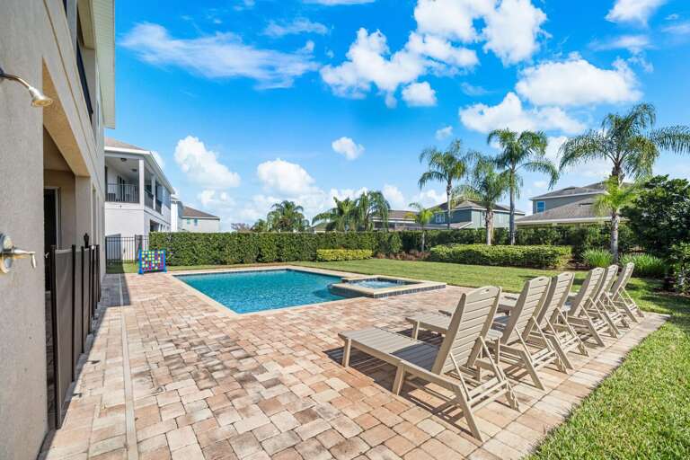 - Your backyard paradise: pool, hot tub, and endless sunshine.
- Sun, fun, and relaxation. Pool, hot tub, and loungers await!