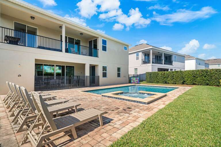 - Your backyard paradise: pool, hot tub, and endless sunshine.
- Sun, fun, and relaxation. Pool, hot tub, and loungers await!