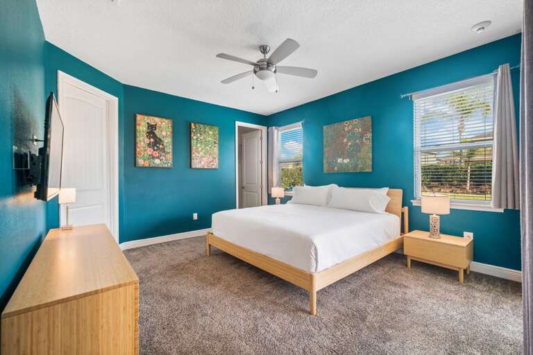 - Cool-toned walls
- Warm wood accents
- Art deco pieces
- A space that feels both modern and cozy