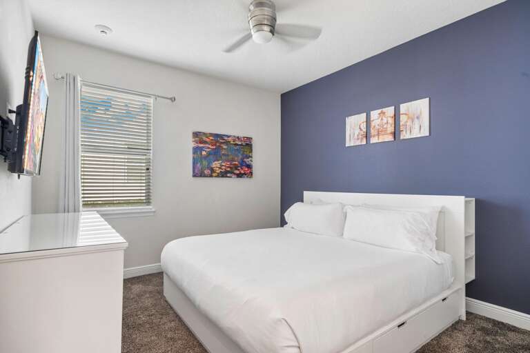 - Cool-toned walls
- White wood accents
- Escape to tranquility