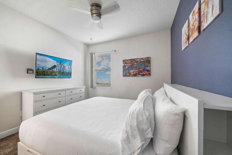 - Cool-toned walls
- White wood accents
- Escape to tranquility