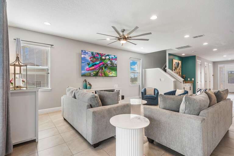 - Cozy lounge seating
- Airy open spaces
- A generous dining area create the perfect setting for family meals.
- Modern comfort meets effortless style indoors