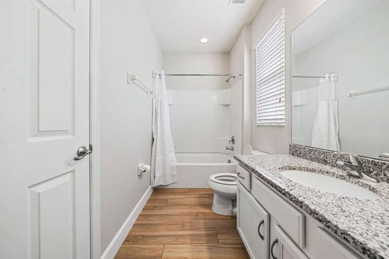 Bathroom w/ bath and shower combo