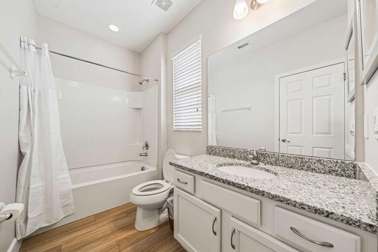 Bathroom w/ bath and shower combo