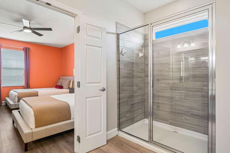 Bathroom w/ glass enclosed shower