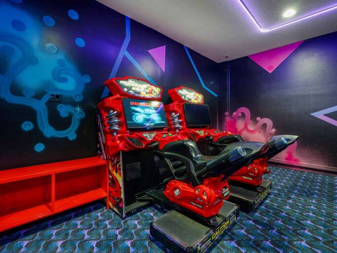 Game room with Arcades, Foosball, and Pool table