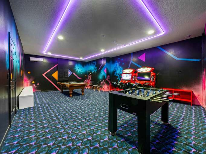 Game room with Arcades, Foosball, and Pool table