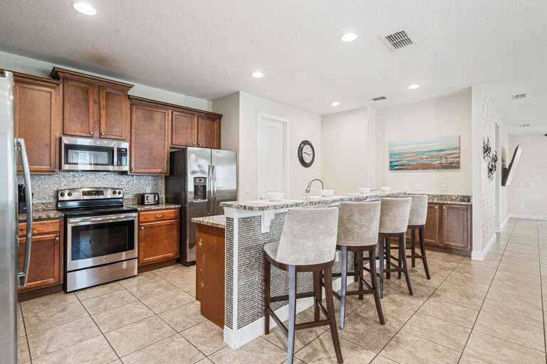 Kitchen area w/ stainless steel appliances