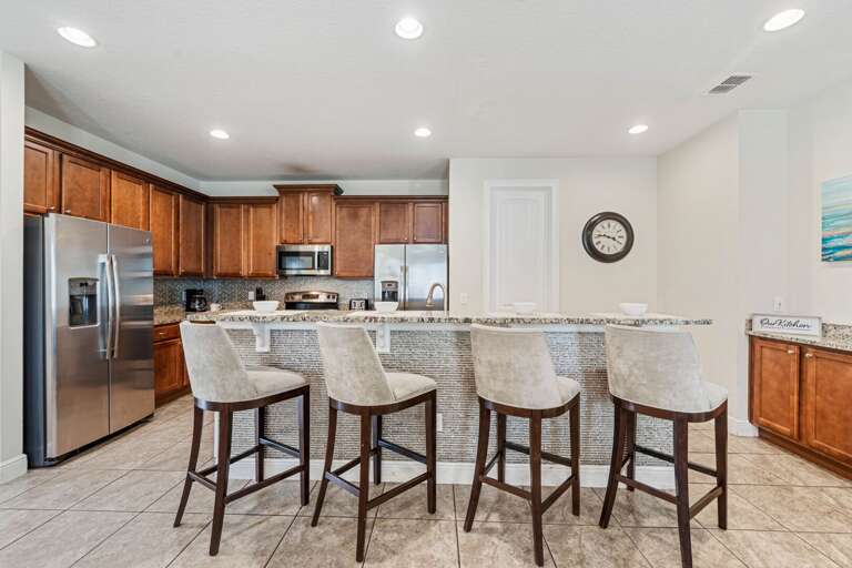 Kitchen area w/ stainless steel appliances