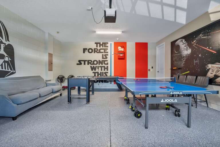 Game room with Foosball and Ping Pong Table.