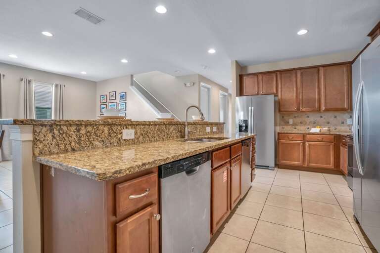 Kitchen area with stainless-steel appliances.