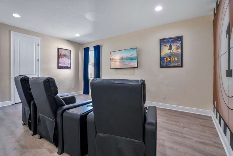 Theater with Luxury recliner seating.