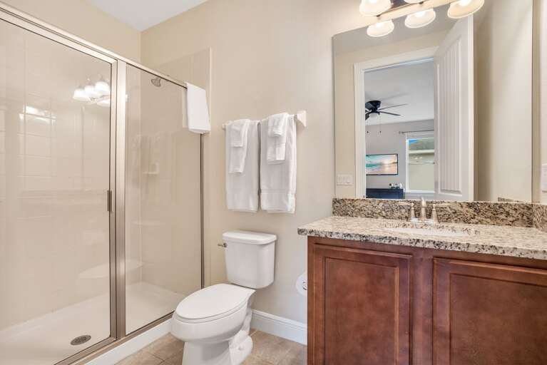 Bathroom with glass enclosed shower