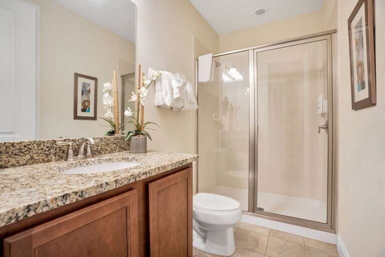 Bathroom with glass enclosed shower