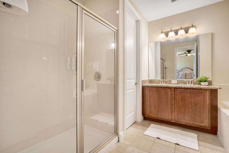 Bathroom with glass enclosed shower