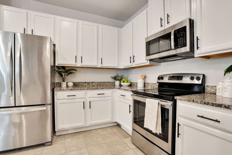 Kitchen area with stainless-steel appliances