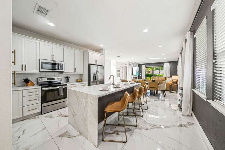 Kitchen area w/ stainless-steel appliances