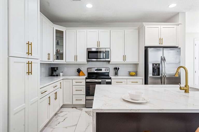 Kitchen area w/ stainless-steel appliances