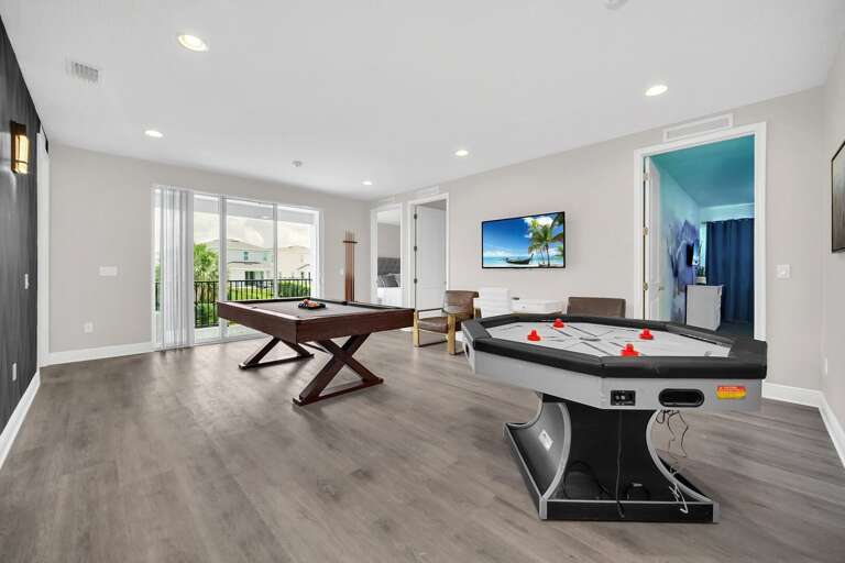 Game area w/ Pool table and Air hockey