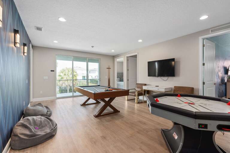 Game area w/ Pool table and Air hockey